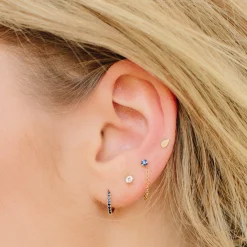 Blue Sapphire Huggies in Yellow Gold