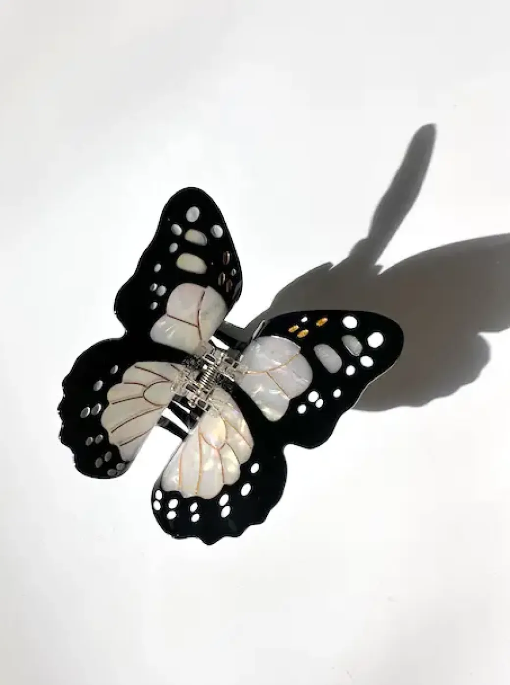 Monarch Butterfly in White Claw Clip